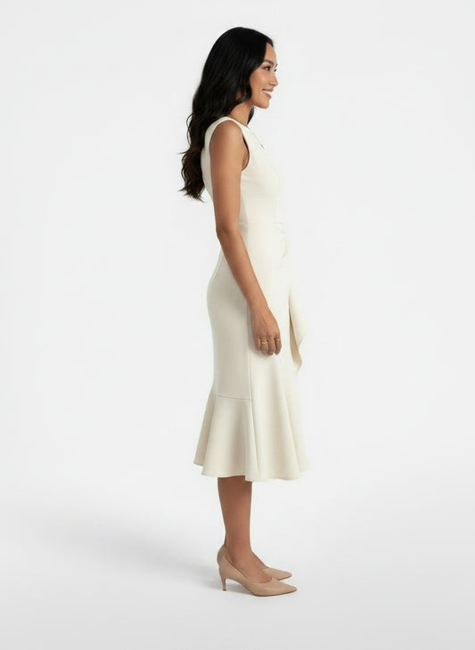 Side profile of the model wearing Vestido Midi Mujer Entallado Elegante