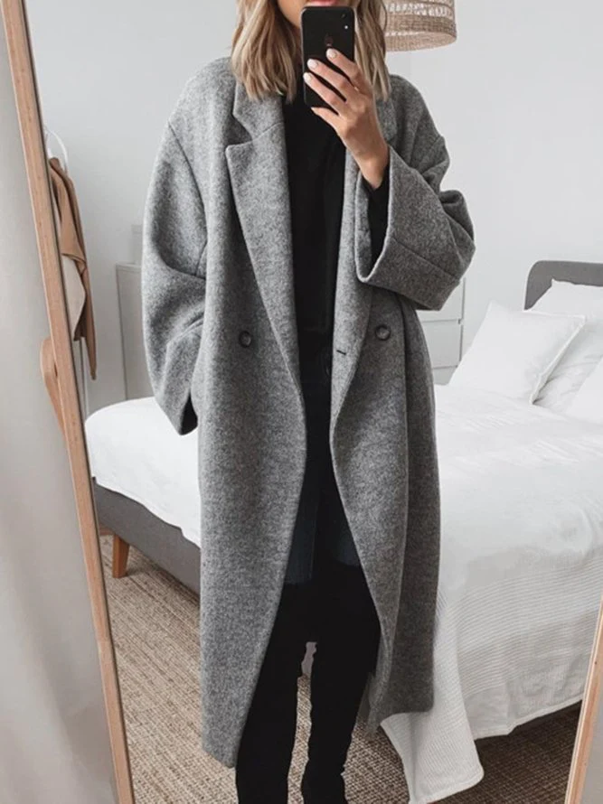 Abrigo largo oversized de doble botonadura con solapas anchas para mujer 1