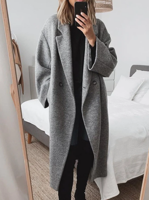 Abrigo largo oversized de doble botonadura con solapas anchas para mujer 1