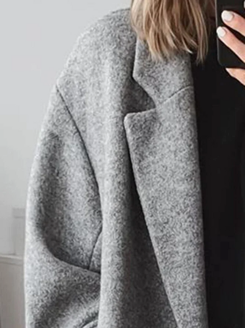 Abrigo largo oversized de doble botonadura con solapas anchas para mujer 6