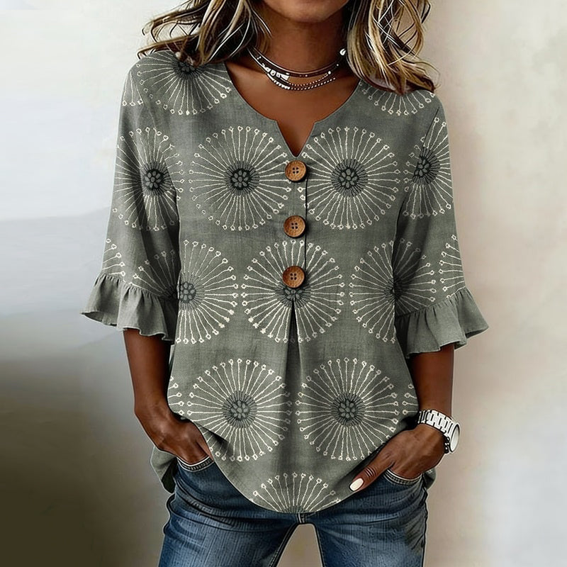 Blusa con estampado floral y mangas acampanadas 1