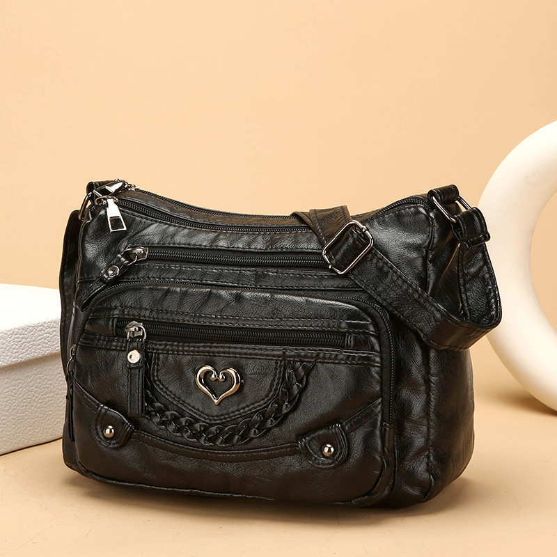 Bolso bandolera de mujer con múltiples compartimentos 1