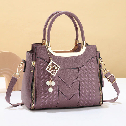 Bolso de mano acolchado mujer con bandolera y detalles dorados 1