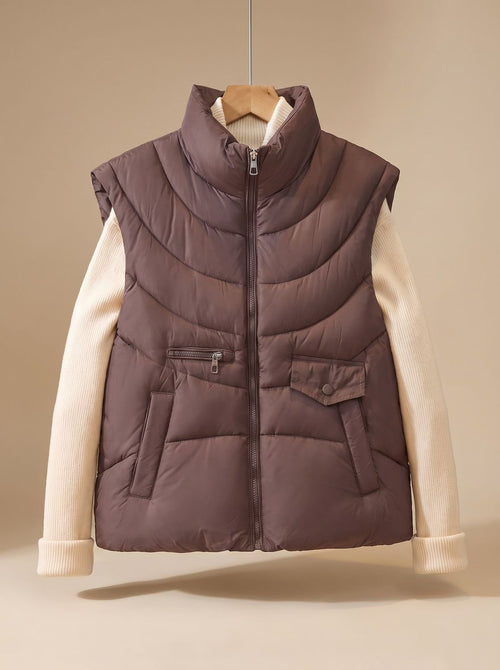 Chaleco acolchado mujer con cuello alto y bolsillos 1