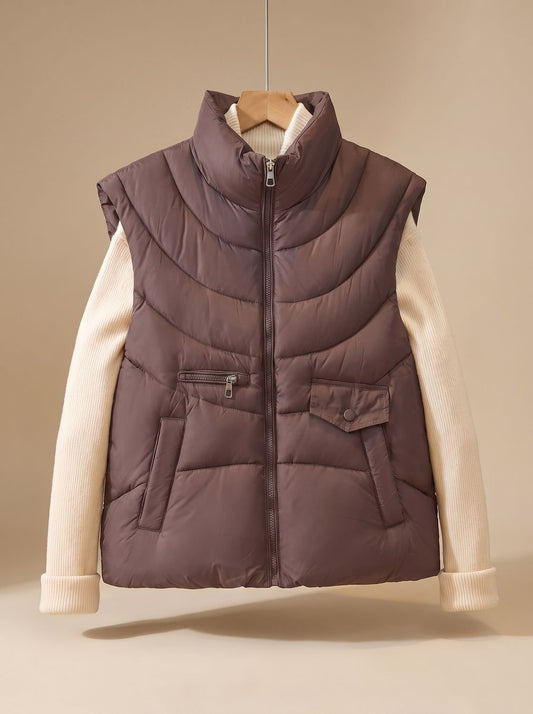 Chaleco acolchado mujer con cuello alto y bolsillos 1