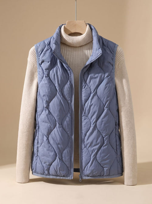 Chaleco acolchado mujer con cuello alto y bolsillos laterales 6