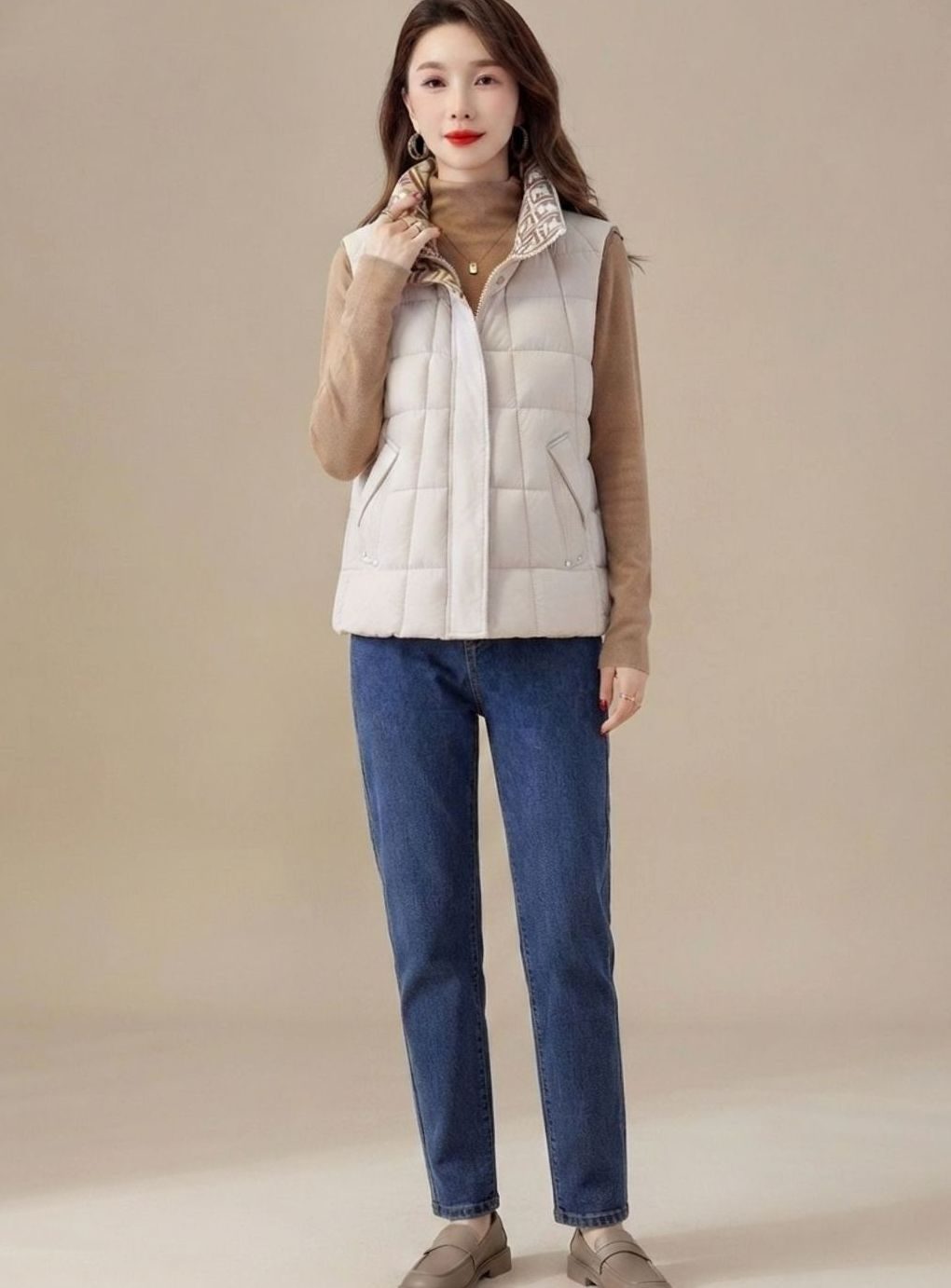 Chaleco acolchado mujer con cuello alto y cordón ajustable 1