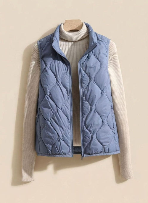 Chaleco acolchado mujer con cuello alto y cremallera ondulada 6
