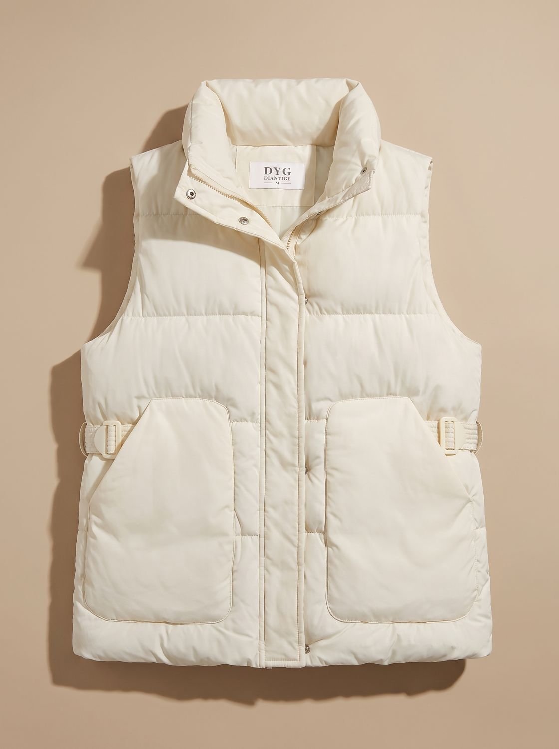 Chaleco acolchado mujer con cuello alto y hebillas laterales 1
