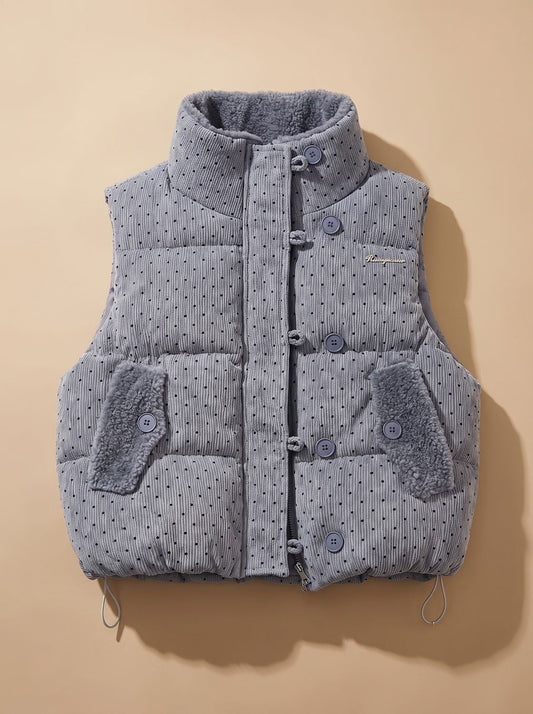 Chaleco acolchado mujer de lunares con cuello alto y botones 1