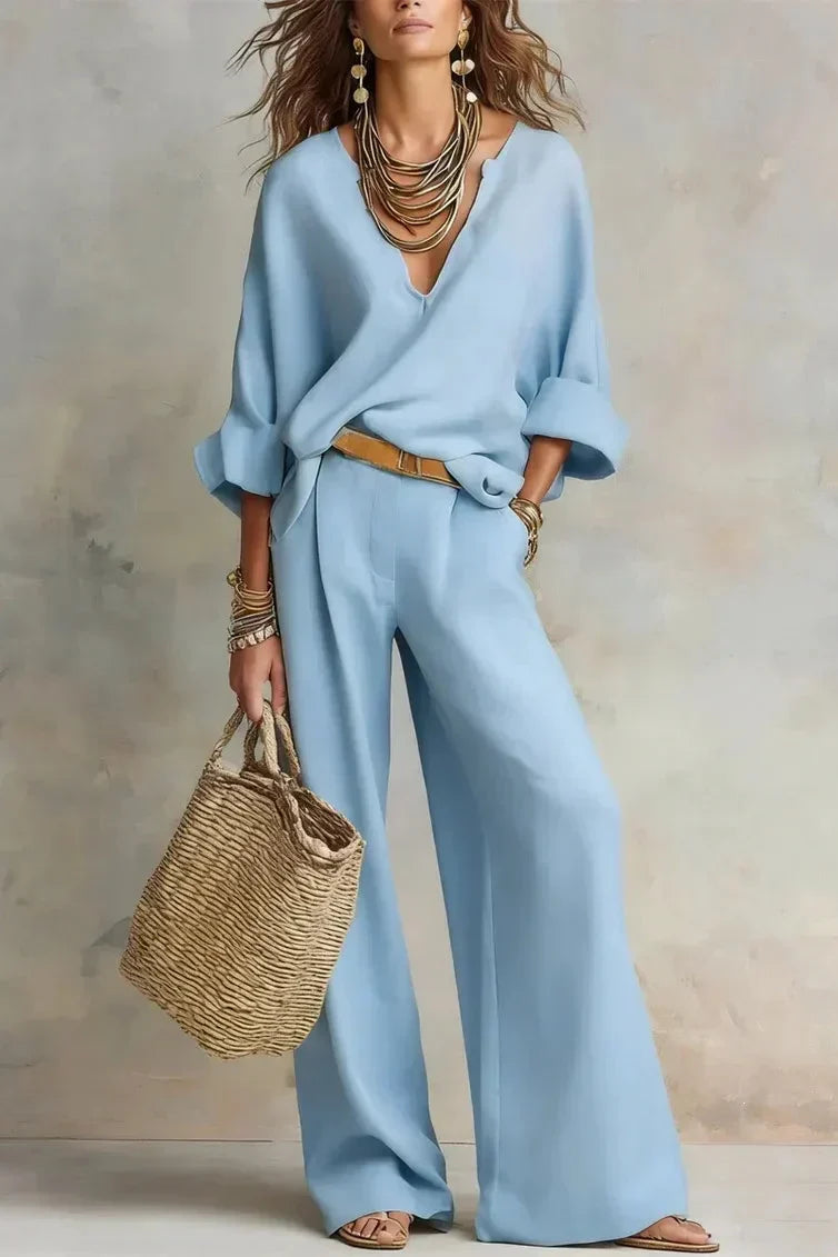 Conjunto fluido con blusa de escote en V y pantalón ancho 4