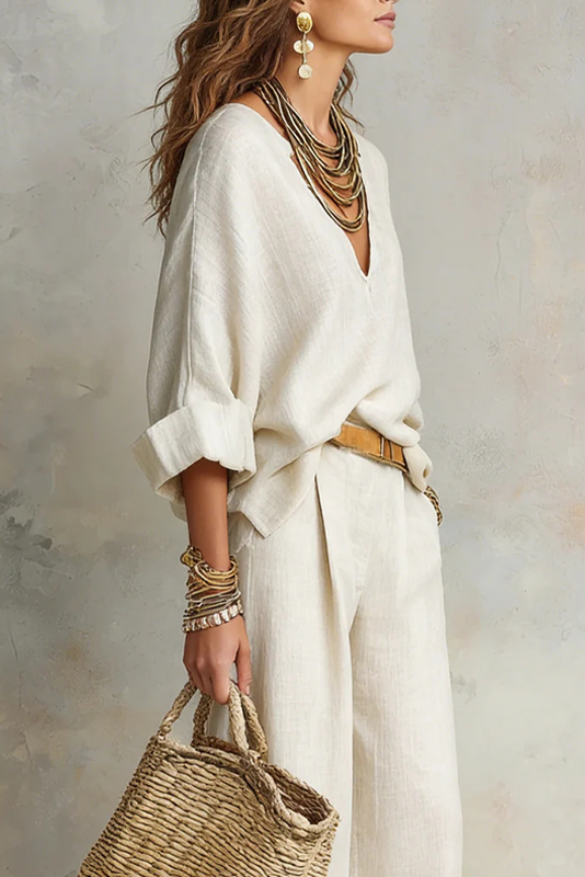 Conjunto fluido con blusa de escote en V y pantalón ancho 7