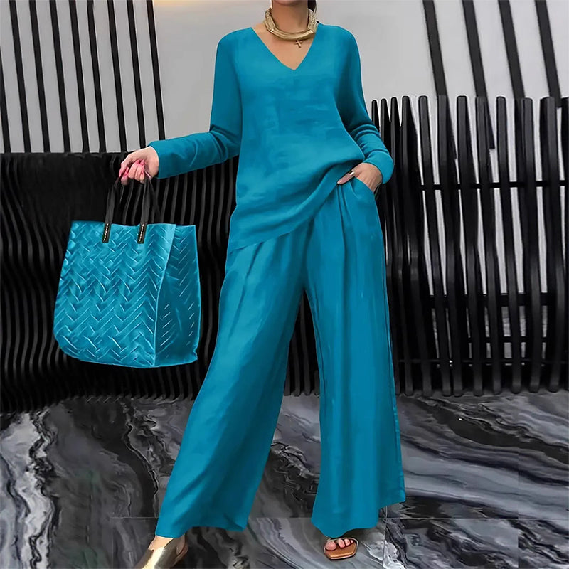 Conjunto fluido con blusa de escote en V y pantalón ancho elegante 7
