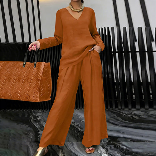 Conjunto fluido con blusa de escote en V y pantalón ancho elegante 8