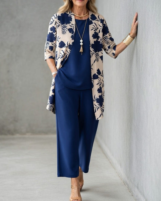 Conjunto tres piezas mujer con chaqueta floral y pantalón fluido 1