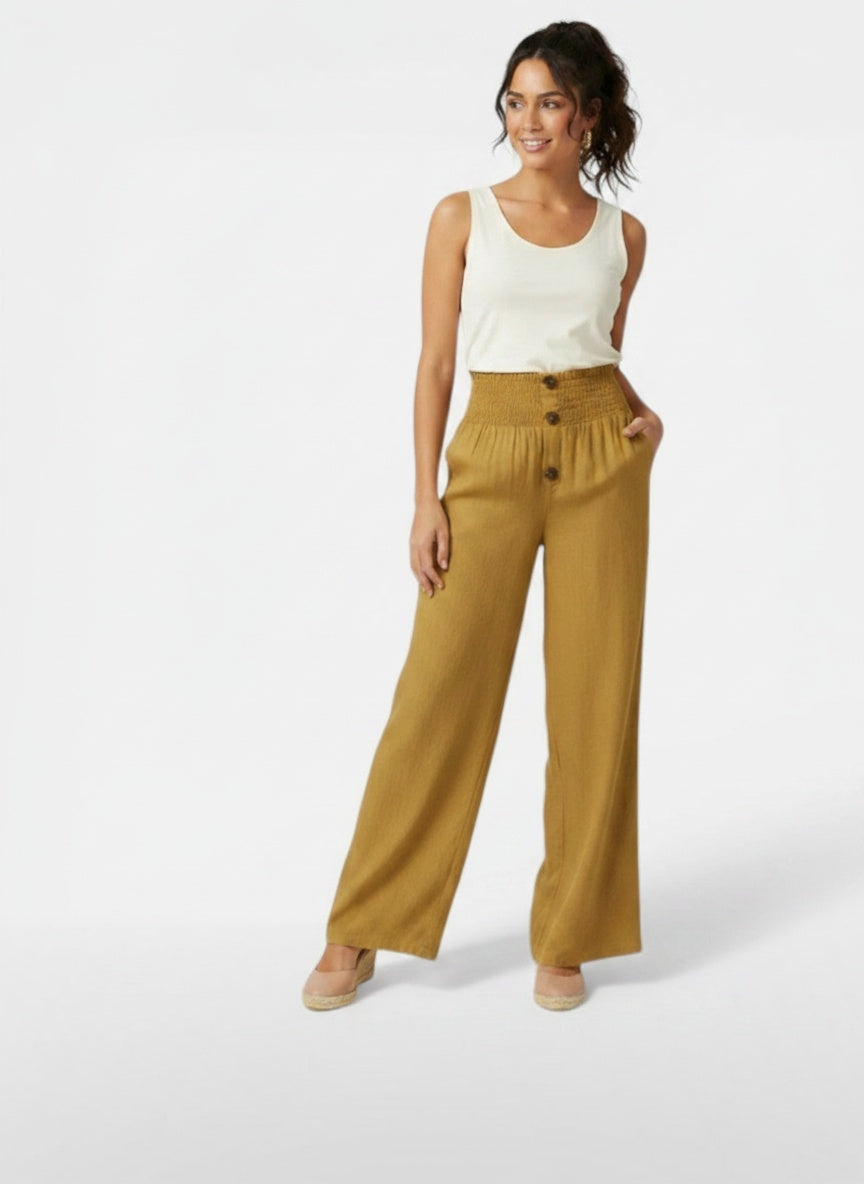 Full body view of the model wearing Pantalón Lino Algodón Cintura Alta