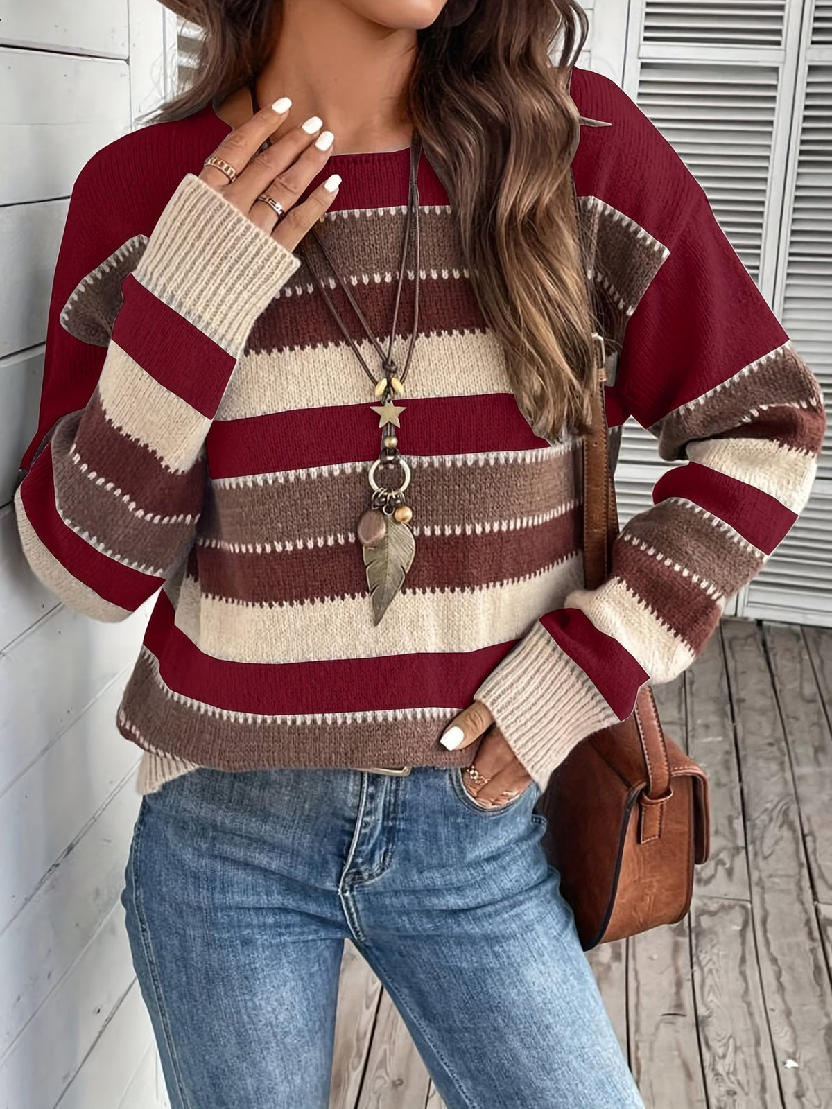 Jersey de punto a rayas de mujer con cuello redondo 13