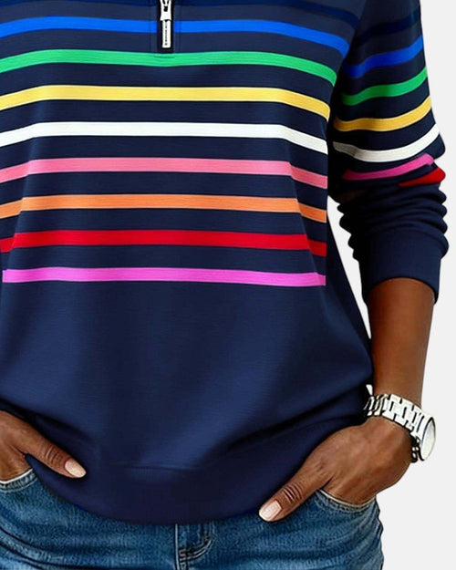 Sudadera mujer a rayas con media cremallera y corte relajado 11