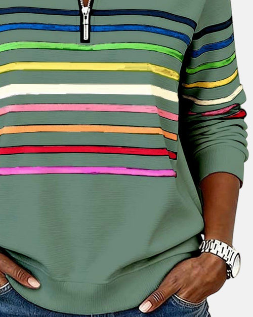Sudadera mujer a rayas con media cremallera y corte relajado 18