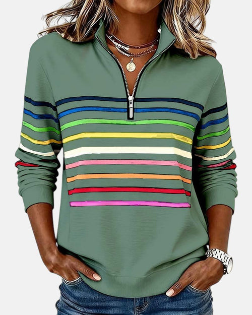Sudadera mujer a rayas con media cremallera y corte relajado 6