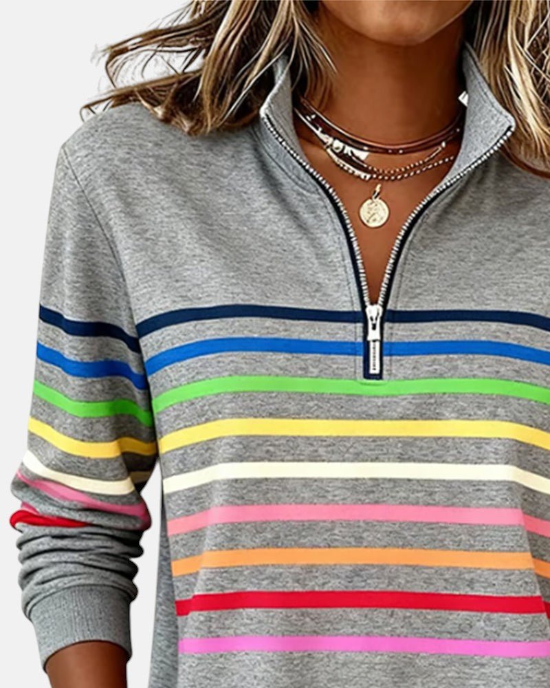 Sudadera mujer a rayas con media cremallera y corte relajado 8