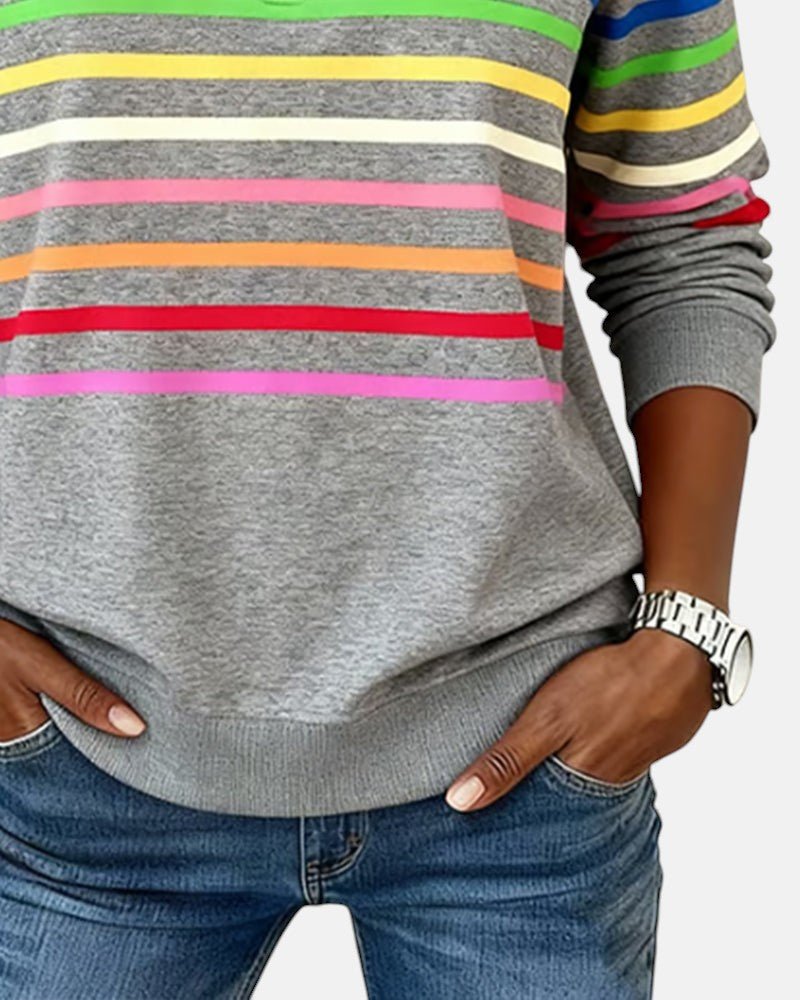 Sudadera mujer a rayas con media cremallera y corte relajado 9