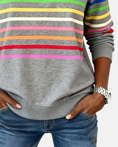 Sudadera mujer a rayas con media cremallera y corte relajado 9