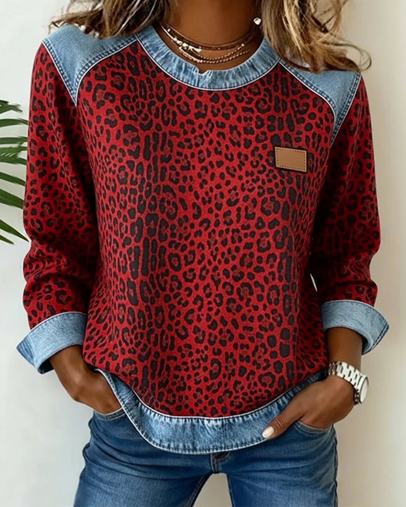 Sudadera mujer de leopardo con detalles vaqueros 3