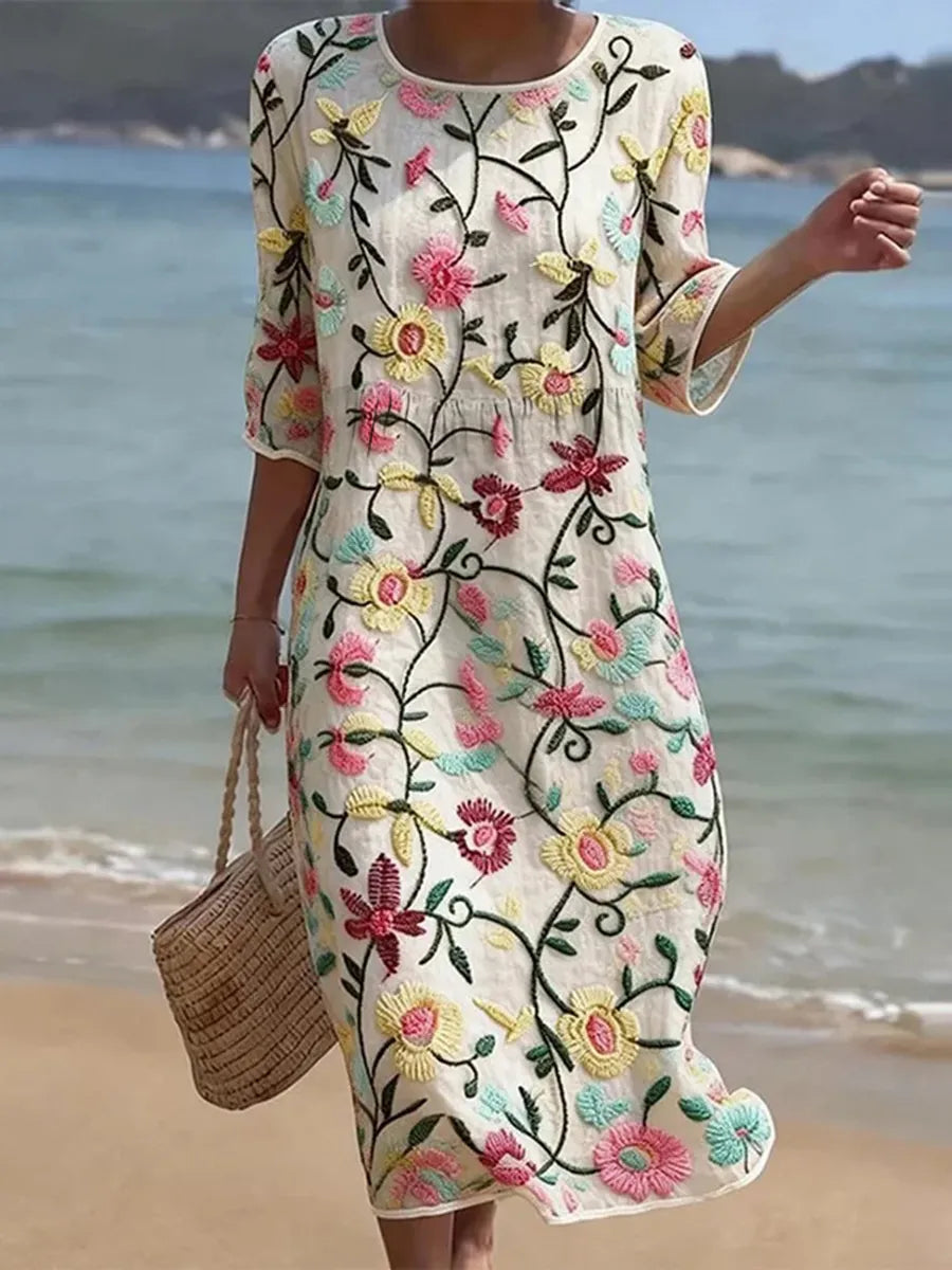 Vestido de verano floral con manga tres cuartos y cuello redondo 1