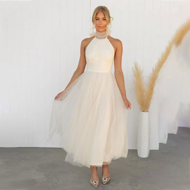 Vestido midi de fiesta con cuello halter y falda de tul 1