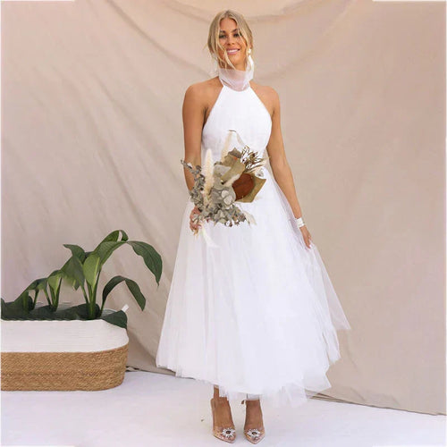 Vestido midi de fiesta con cuello halter y falda de tul 4
