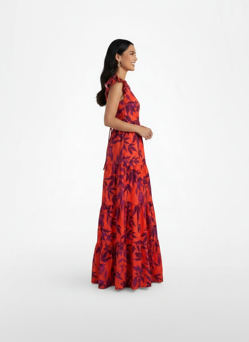 Side profile of the model wearing Vestido Largo Rojo Elegante Mujer